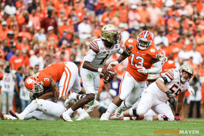 Tyler Davis (13) pressures FSU QB James Blackmon (1)